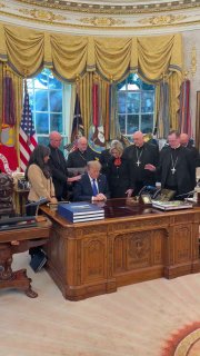 Catholic archbishops and bishops pray with Trump in the Oval Office.