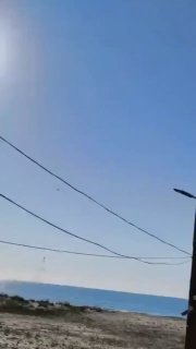 מיג-29 האוקראיני צד שאהד המופעל על ידי סילון בגובה נמוך מעל החוף של אודסה.