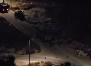 Under the auspices of the occupation army, settlers steal animals during their attack on the town of Silwad, northeast of Ramallah.