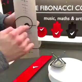 A clock that uses a Fibonacci spiral to tell time.Science and facts💡