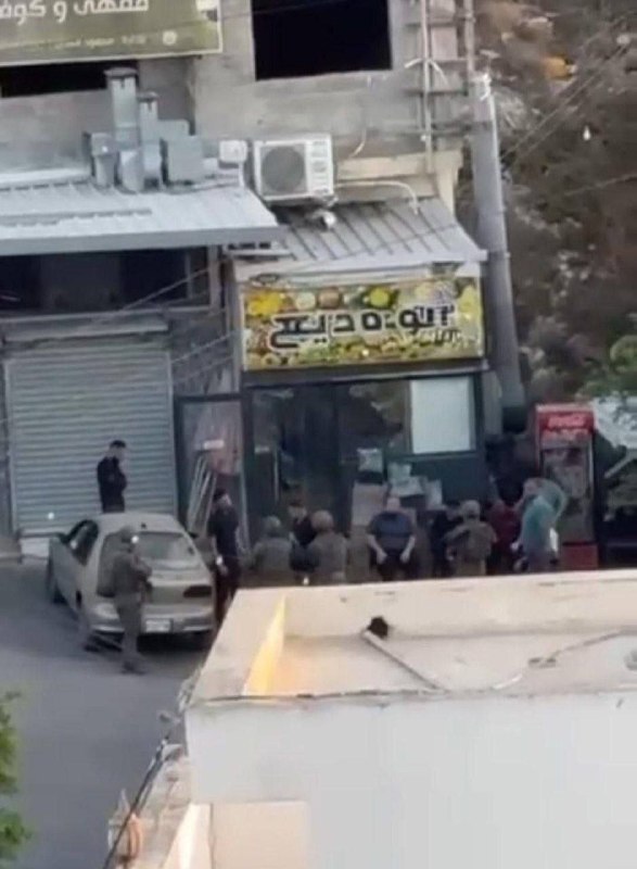 The occupying forces in the area interrogate a number of Palestinians during the assault on the town of Alar, north of Tulkarm.