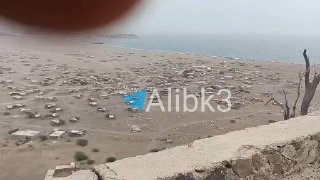Yemeni forces are seen from the summit of Mount Bab al-Mandab, with the island of Mayon (the gateway to the Red Sea) visible in front of them.
