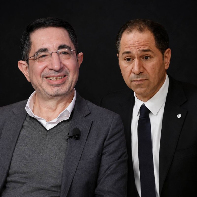 ויכוח בין חברי הפרלמנט סמי גמאייל וחוסין חאג' חסן לאחר שהאחרון מתח ביקורת על הרשויות בנוגע להסכם המסגרת:
