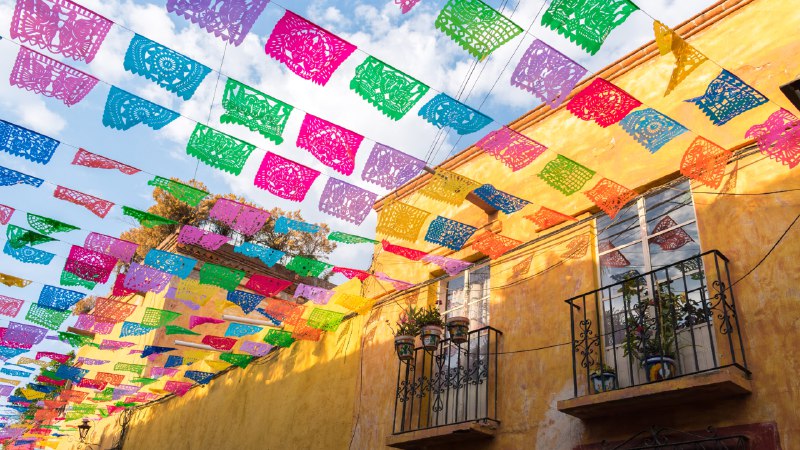 Viva Mexico!Paper flags strung over a street in San Miguel de Allende, Mexico (© William Zinn/Getty Images)