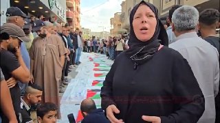 Palestinians bury dozens of dead from Nuseirat camp