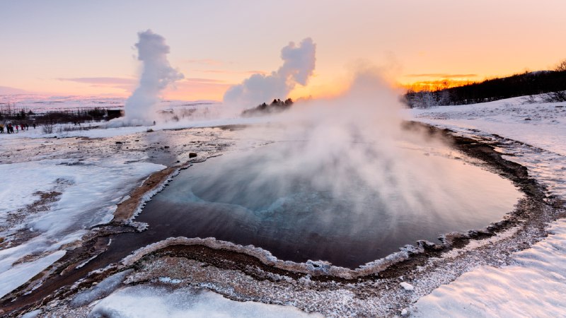 Bubbling with powerStrokkur geyser in Iceland (© John and Tina Reid/Getty Images)