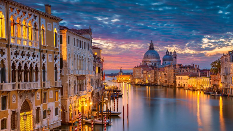 It's carnival time!Grand Canal with Santa Maria della Salute Basilica, Venice, Italy (© RudyBalasko/Getty Images)