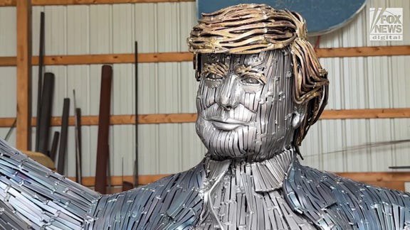 Sculpture depicting iconic Trump assassination attempt photo displayed in Oval Office