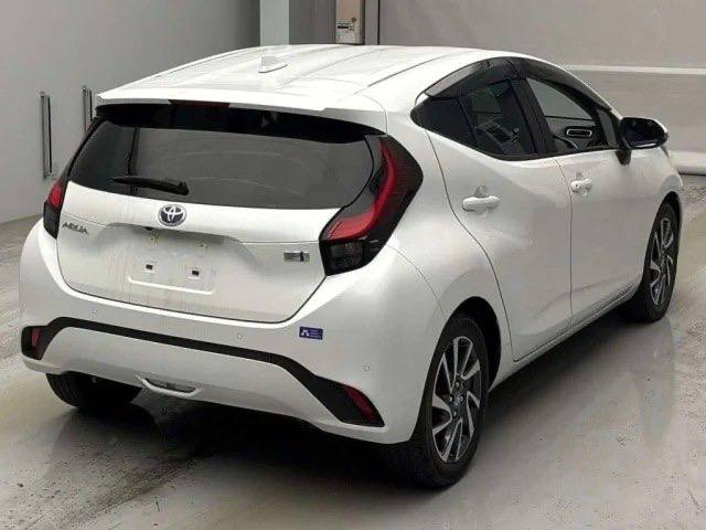 Toyota Aqua 2023 фото 2