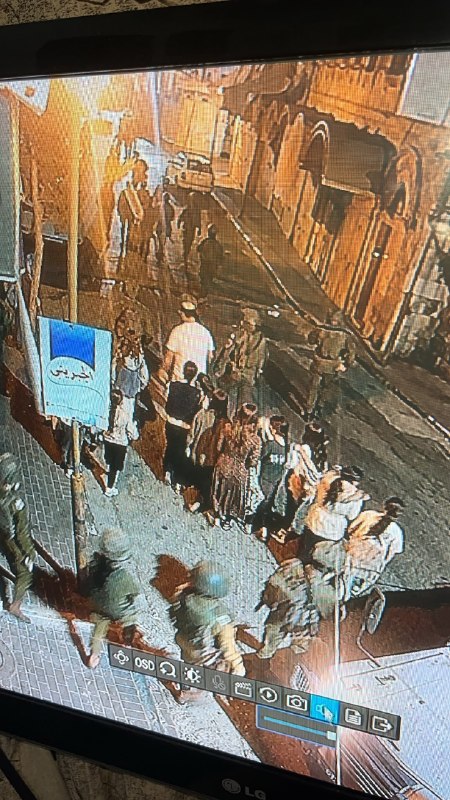 Settlers, protected by the occupation army, storm the old city in Hebron.