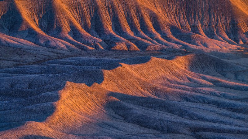 Waves of timeSandstone formations in the badlands near Caineville, Utah (© Chris Moore/TANDEM Stills + Motion)