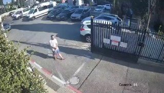 A settler attacks the Orthodox Church of John the Baptist in occupied Haifa with stones.