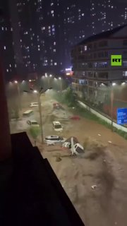 🎦 ראש גדוד מכוניות בשיטפון ההרסני בצפון מזרח סין