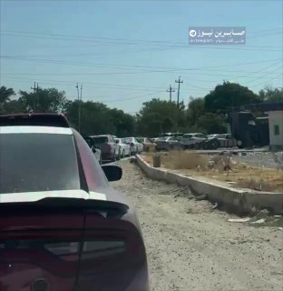 "אנחנו חיים בחוסר צדק". אזרח מתלונן על המשברים בעיראק בזמן שהוא ממתין בתור לדלק
