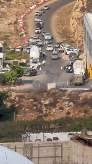 Settlers storm Bitunya and desecrate it with dancing and celebrations.