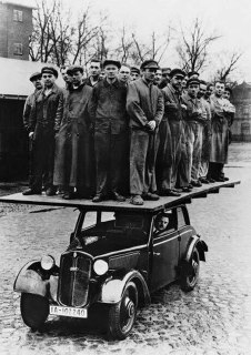 A demonstration of the strength of the automobile in the 1930s.📚 Buzz History
