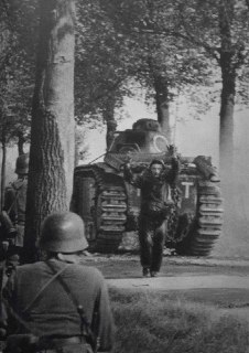 A French tank crew surrenders in front of a Char B1 heavy tank. Belgium, 1940.Time Machine | Historical Photo